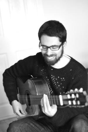 daniel-smiling-playing-small-contrast