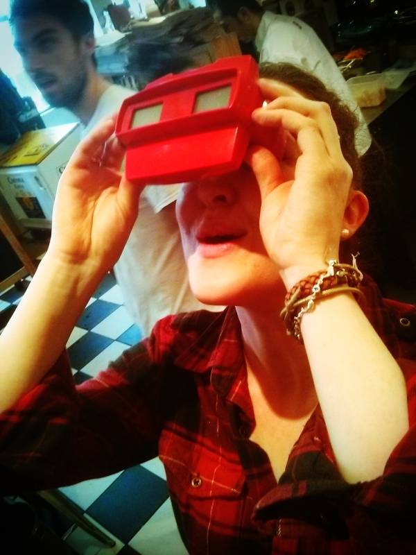 a girl enjoys the viewmaster - Ryan Van Winkle & Dan Gorman